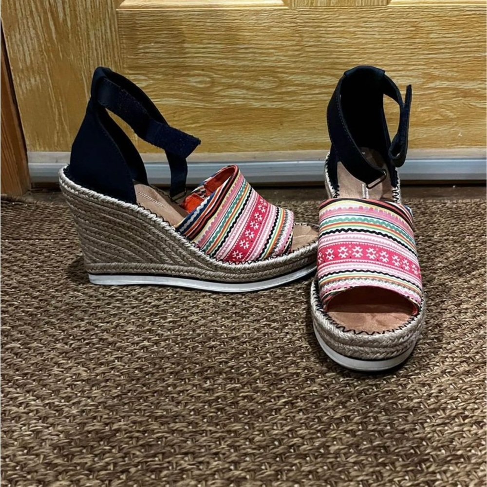 New with tags, worn one time. Toms Marisol wedges. Size 9